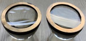 Close-up of a pair of glasses

Description automatically generated