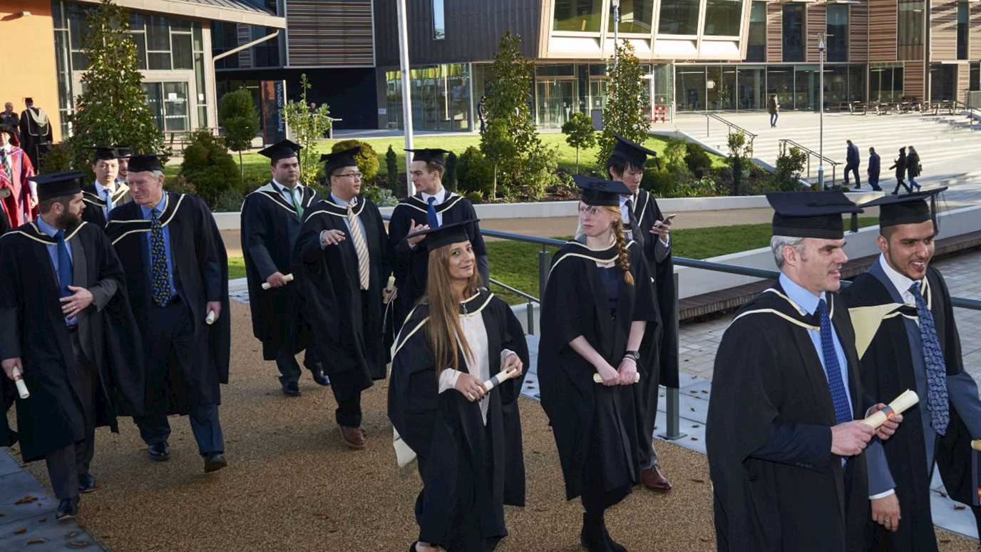 Students graduating - Postgrad tuition fees